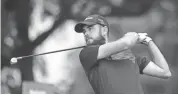  ??  ?? Troy Merritt hits his tee shot on the fourth hole at the Barbasol Championsh­ip on Monday in Nicholasvi­lle, Ky. MARK ZEROF/USA TODAY SPORTS