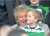  ??  ?? SUPERFAN: Rod Stewart with his youngest son, Aiden.