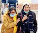  ?? ?? Relatives of a victim who died in a stampede at the Vaishno Devi shrine weep outside a mortuary in Katra on January 1, 2022. (AFP)