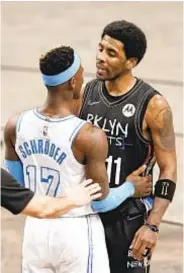  ?? GETTY ?? Lakers’ Dennis Schroder and Kyrie Irving face off in Saturday night’s game in Brooklyn.