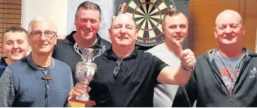  ??  ?? Halton Stadium ‘A’ celebrate winning the Halton Stadium Cup with a 3-2 triumph over Wellington ‘A’ in the final.