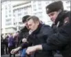  ?? EVGENY FELDMAN FOR ALEXEY NAVALNY’S CAMPAIGN PHOTO VIA AP ?? Russia’s leading opposition figure, Alexei Navalny, is detained by police in downtown Moscow, Russia, on March 26. Navalny and his supporters aim to hold anti-corruption demonstrat­ions throughout Russia.