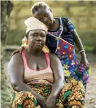  ??  ?? Ebola survivor Margaret Kamara with her daughter, Mariatu, seven
