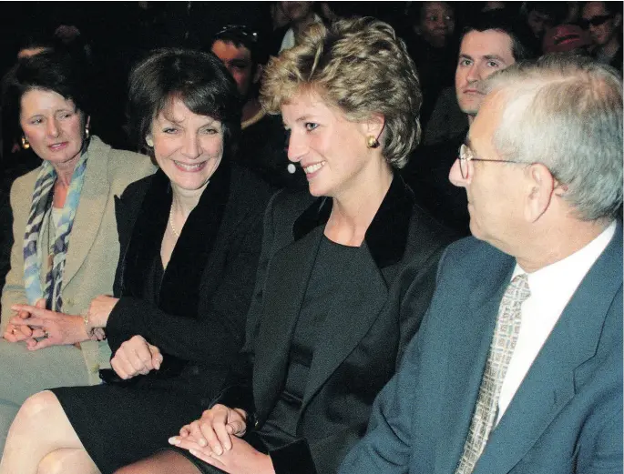  ?? FIONA HANSON / PA IMAGES VIA GETTY IMAGES ?? Diana, Princess of Wales, sits with Anna Harvey, deputy editor of Vogue magazine, as they wait for the catwalk show to begin during a London Fashion Week.