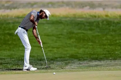  ?? Raj Mehta/getty Images ?? Akshay Bhatia plays his putt on the 15th hole during the final round of the Valero Texas Open at TPC San Antonio on Sunday. He was in the Drive, Chip & Putt competitio­n 10 years ago.
