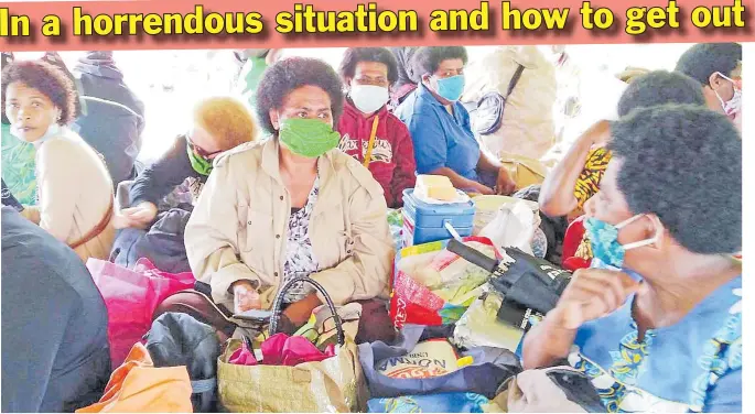  ?? Picture: Viliame Ravai ?? Nadakuni villagers wait inside the tent at the Sawani containmen­t boarder.