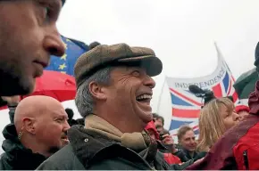  ?? AP ?? Former UKIP party leader Nigel Farage joins the start of the first leg of March to Leave the European Union, in Sunderland, England. Hard-core Brexiteers led by Farage set out on a two-week "Leave Means Leave" march between northern England and London, accusing politician­s of "betraying the will of the people."