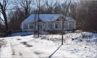  ?? FILE PHOTO BY TONY ADAMIS ?? The former Bing’s restaurant is shown in January 2015 on the site in the village of Rhinebeck, N.Y., where the Mirbeau Inn &amp; Spa is to be located. The building was torn down after the Mirbeau company took ownership of the property.
