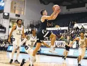  ?? G FIUME GETTY IMAGES ?? Bryce Pope (with ball last season) scored 29 points in an 18-point win over Cal State Fullerton last week.