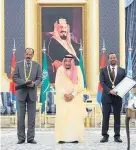  ??  ?? Saudi King Salman, centre, with Eritrean President Isaias Afwerki, left, and Ethiopian Prime Minister Abiy Ahmed, right, in Jeddah, Saudi Arabia yesterday