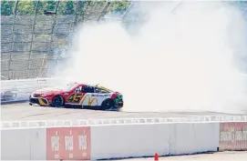  ?? Matt Slocum/Associated Press ?? Kurt Busch spins as he takes part in qualifying for the NASCAR Cup Series at Pocono Raceway on July 23 in Long Pond, Pa. Busch’s career was prematurel­y curtailed from the lingering effects of a concussion suffered in the incident during qualifying last summer at Pocono Raceway.