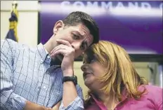  ?? Mario Tama/Getty Images ?? U.S. House Speaker Paul Ryan speaks with U.S. Rep. Jenniffer Gonzalez-Colon at a news conference Friday in San Juan, Puerto Rico. Mr. Ryan led a delegation to visit areas damaged by Hurricane Maria.