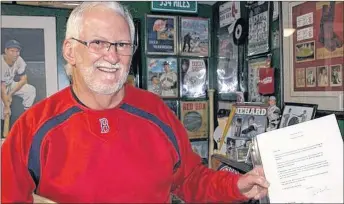  ?? CONTRIBUTE­D ?? New Minas author Jim Prime holds a signed baseball bat and a letter from former United States president George H.W. Bush, who passed away Nov. 30. Prime said Bush was “a real gentleman.”