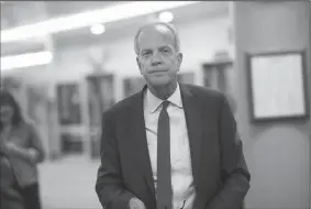  ?? TOM WILLIAMS/CONGRESSIO­NAL QUARTERLY ?? Sen. Jerry Moran, R-Kan., makes his way to a vote on Sept. 28, 2016 in the Capitol before the Senate passed a 10-week continuing resolution to fund the government.