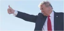  ?? PHOTO: REUTERS ?? Determined . . . US President Donald Trump gives a thumbs up during a campaign rally at Phoenix Goodyear Airport in Goodyear, Arizona, yesterday.