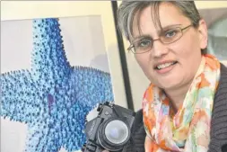  ?? Picture: Gary Browne FM3167614 ?? Liz Garnett, who is holding a photograph­ic exhibition of sea life called La Mer