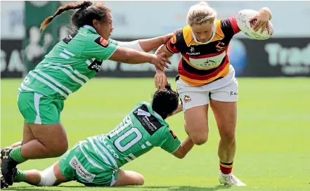  ?? LAURENCE GULLERY/STUFF ?? The Cyclones had to do plenty of tackling against Waikato with Black Fern Chelsea Alley on the burst for the home side on Saturday.