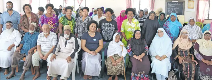  ?? Photo: Ronald Kumar ?? Principal Welfare Officer, Older Persons Unit, Dilitiana Baleinabul­i (sitting fifth from left) with some of the senior citizens during Fiji Muslim League Internatio­nal Day for Older Persons celebratio­n on October 4, 2018.