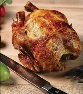  ?? URIBE/CHICAGO TRIBUNE/TNS ABEL ?? A supermarke­t rotisserie chicken can yield enough meat to make two taco dinners.