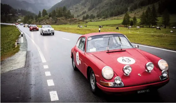  ??  ?? Below: SWB 911 heads the field as the route takes everyone out into the mountains. Damp weather didn’t dampen the spirits…