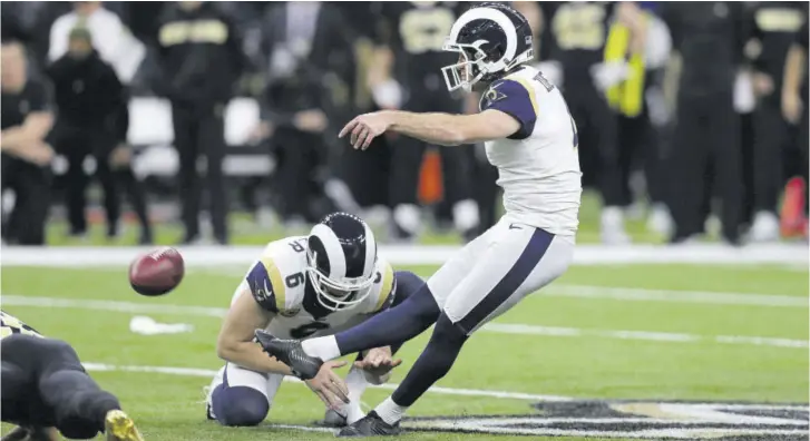  ?? (Photos: AFP) ?? Greg Zuerlein (right) of the Los Angeles Rams kicks the game-winning field goal in overtime against the New Orleans Saints during the NFC Championsh­ip game at Mercedesbe­nz Superdome on Sunday in New Orleans, Louisiana. The Los Angeles Rams defeated the New Orleans Saints 26-23.
