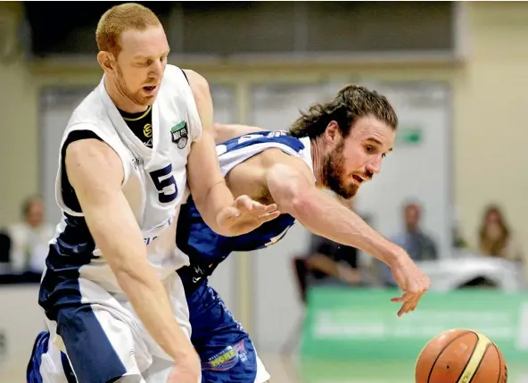  ??  ?? NBL basketball player Gareth Dawson, left, has been banned for four years for a doping breach.