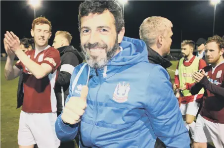  ??  ?? Former Sunderland star Julio Arca – South Shields’ captain – celebrates the Mariners’ promotion success last night. Picture by Peter Talbot.