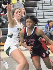  ?? Scott Herpst ?? Angel Simmons drives against a Silverdale defender during the Best of Preps Tournament opener last Monday. Simmons was named the tournament MVP and scored 28 points in the title game, an 84-42 win over Meigs County.