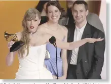  ?? AP PHOTOS ?? Taylor Swift accepts the award for Album of the Year for ‘Midnights’ during the 66th annual Grammy Awards.