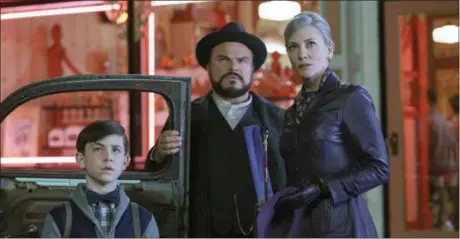  ?? QUANTRELL D. COLBERT/UNIVERSAL PICTURES VIA AP ?? Owen Vaccaro, from left, Jack Black and Cate Blanchett in a scene from “The House With A Clock in Its Walls.”