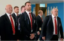  ?? PHOTO: GETTY IMAGES ?? John Spencer, left, stands with Lions tour captain Sam Warburton and coach Warren Gatland as the team is welcomed to New Zealand at Auckland Airport.