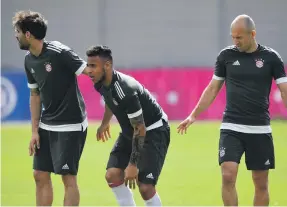  ?? AFP ?? Corentin Tolisso, centre, recovering from a shin injury, trained yesterday in Munich