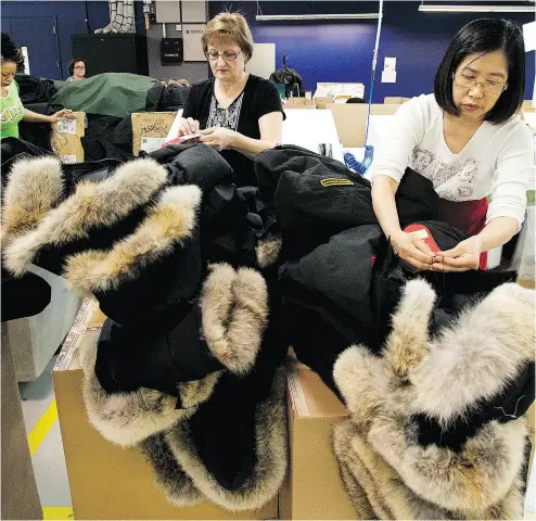  ?? NATHAN DENETTE / THE CANADIAN PRESS ?? Canada Goose, with backing from private- equity firm Bain Capital, is said to be planning an IPO for next year.