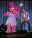  ?? FELD ENTERTAINM­ENT ?? Abby Cadabby and Caleb pal around in Sesame Street Live! “Let’s Party!”