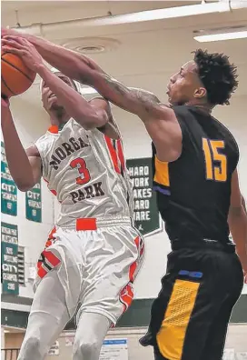  ?? | WORSOM ROBINSON/ FOR THE SUN- TIMES ?? Talen Horton- Tucker ( left) is one of the top all- around players in the state. Messiah Jones ( 15) is averaging a double- double.