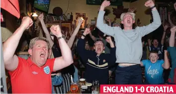  ??  ?? England’s dreaming: Fans at Molly’s Bar in Letterfrac­k, Co. Galway, cheer opener