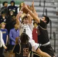  ?? CONTRIBUTE­D BY STEPHEN SPILLMAN ?? Cedar Park’s Karson Cater (center) looks to shoot as he is defended by Rouse’s Ben Escobar (right) and Trevor Berry. Rouse won 44-37 and is 10-0 in 19-5A this season.