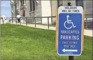  ?? CYRUS DOS SANTOS / CTNEWSJUNK­IE ?? Handicappe­d parking sign at the state Capitol in Hartford