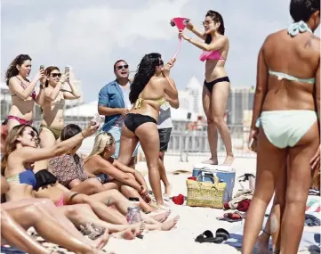  ?? AL DIAZ Miami Herald file, 2015 ?? Miami Beach is asking event planners to pitch ideas for spring break 2020 in an effort to make the festivitie­s safer and more organized. One option would be to host concerts every weekend in March.