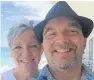  ??  ?? Jennifer Blodgett with husband Scott, and the house of a neighbour which took a direct hit from a falling tree during Hurricane Irma.