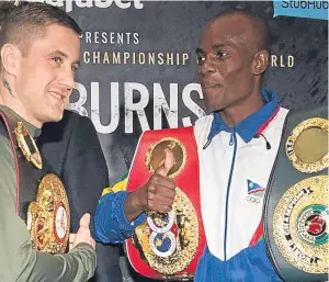  ?? Picture: SNS Group. ?? Ricky Burns and Julius Indongo meet at a press conference yesterday in Glasgow. The pair fight tomorrow at the SSE Hydro with the unified super lightweigh­t world championsh­ip on the line.