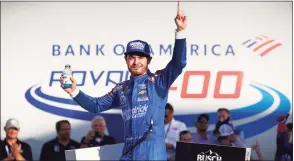  ?? Jared C. Tilton / Getty Images ?? Kyle Larson celebrates in Victory Lane after winning the NASCAR Cup Series Bank of America ROVAL 400 at Charlotte Motor Speedway on Sunday in Concord, N.C.