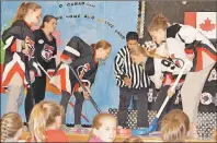  ?? ERIC MCCARTHY/JOURNAL PIONEER ?? “The Hockey Song,” was performed theatrical­ly and musically Thursday during Ellerslie Elementary School’s Canada 150 concert.