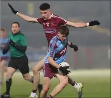  ?? ?? Liam Corry gathers possession for St. Michael’s during their loss to Omagh CBS last Wednesday night.