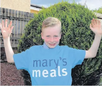  ??  ?? Splash hit St Brigid’s pupil Adam Flynn has raised over £1000 for charity