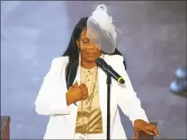  ?? Pool / Getty Images ?? Rochelle Gooden, Rayshard Brooks’ mother-in-law, speaks at his funeral in Ebenezer Baptist Church on Tuesday in Atlanta.