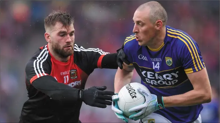  ??  ?? Aidan O’Shea and Kieran Donaghy tussle for possession during Sunday’s All-Ireland semi-final clash at Croke Park.