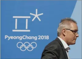 ?? Felipe Dana ?? The Associated Press Matthieu Reeb, secretary general of the Court of Arbitratio­n for Sport, leaves a press conference Thursday in Pyeongchan­g, South Korea.