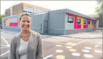  ?? CP PHOTO ?? Marie-jose Mastromona­co, vice-president of the Montreal School Board, is seen next to temporary classrooms at the Saint-gabriel-lalemant in Montreal last week.