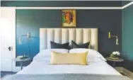  ?? Mary Costa, provided by Caitlin Murray ?? Interior designer Caitlin Murray often hunts for portraits like the one in this bedroom she designed at flea markets and uses them to unite colors in a room.